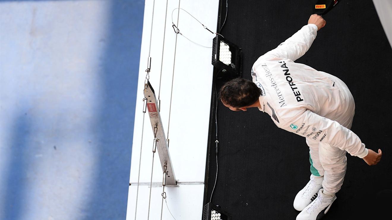 Lewis Hamilton (GBR) Mercedes AMG F1 celebrates on the podium at Formula One World Championship, Rd3, Chinese Grand Prix, Race, Shanghai, China, Sunday 12 April 2015. © Sutton Motorsport Images