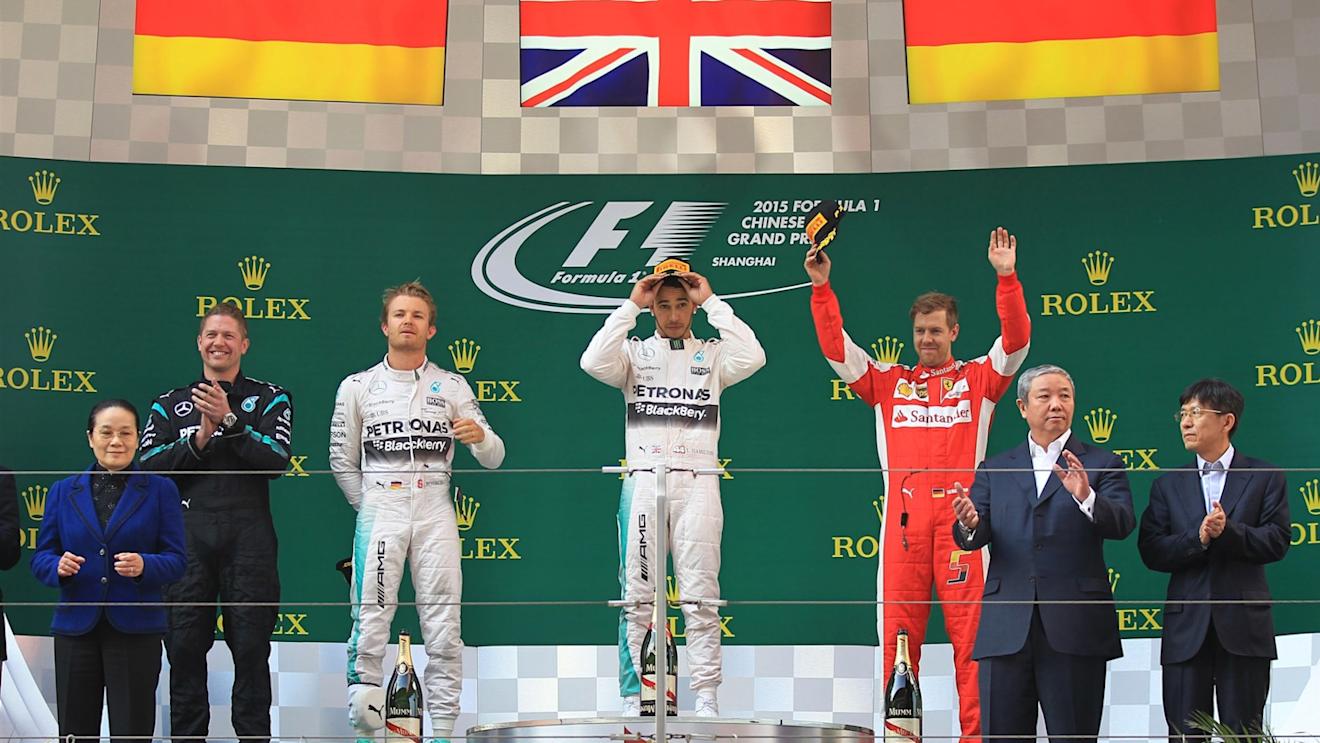 (L to R): Nico Rosberg (GER) Mercedes AMG F1, race winner Lewis Hamilton (GBR) Mercedes AMG F1 and Sebastian Vettel (GER) Ferrari celebrate on the podium at Formula One World Championship, Rd3, Chinese Grand Prix, Race, Shanghai, China, Sunday 12 April 2015. © Sutton Motorsport Images