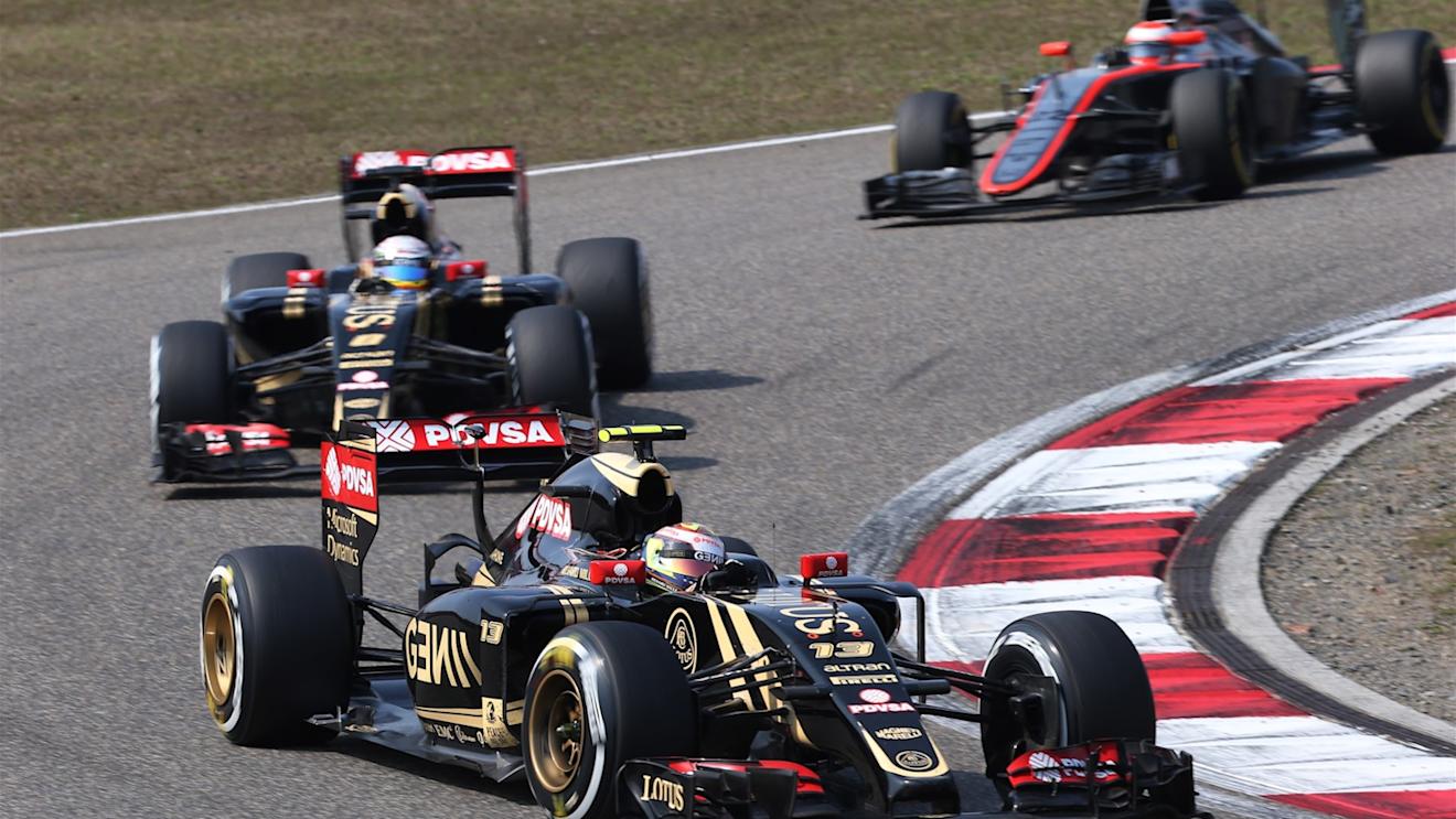 Pastor Maldonado (VEN) Lotus E23 Hybrid leads Romain Grosjean (FRA) Lotus E23 Hybrid at Formula One World Championship, Rd3, Chinese Grand Prix, Race, Shanghai, China, Sunday 12 April 2015. © Sutton Motorsport Images