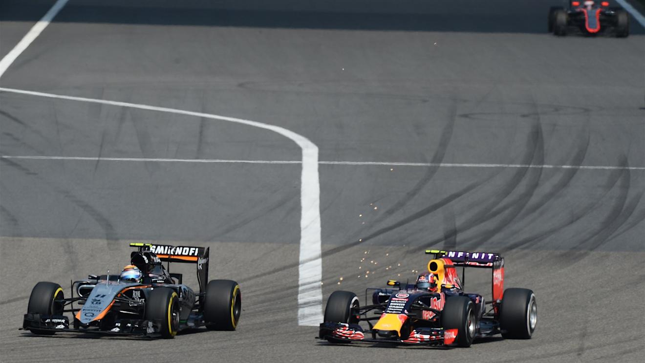 Sergio Perez (MEX) Force India VJM08 and Daniil Kvyat (RUS) Red Bull Racing RB11 at Formula One World Championship, Rd3, Chinese Grand Prix, Race, Shanghai, China, Sunday 12 April 2015. © Sutton Motorsport Images