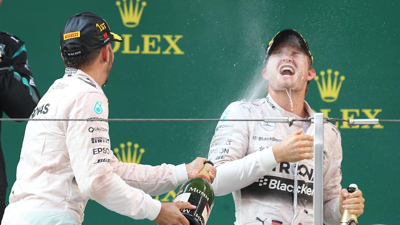 Race winner Lewis Hamilton (GBR) Mercedes AMG F1 celebrates with Nico Rosberg (GER) Mercedes AMG F1 and champagne on the podium at Formula One World Championship, Rd3, Chinese Grand Prix, Race, Shanghai, China, Sunday 12 April 2015. © Sutton Motorsport Images