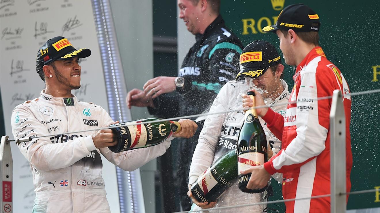 Nico Rosberg (GER) Mercedes AMG F1, Lewis Hamilton (GBR) Mercedes AMG F1 and Sebastian Vettel (GER) Ferrari celebrate on the podium with champagne at Formula One World Championship, Rd3, Chinese Grand Prix, Race, Shanghai, China, Sunday 12 April 2015. © Sutton Motorsport Images