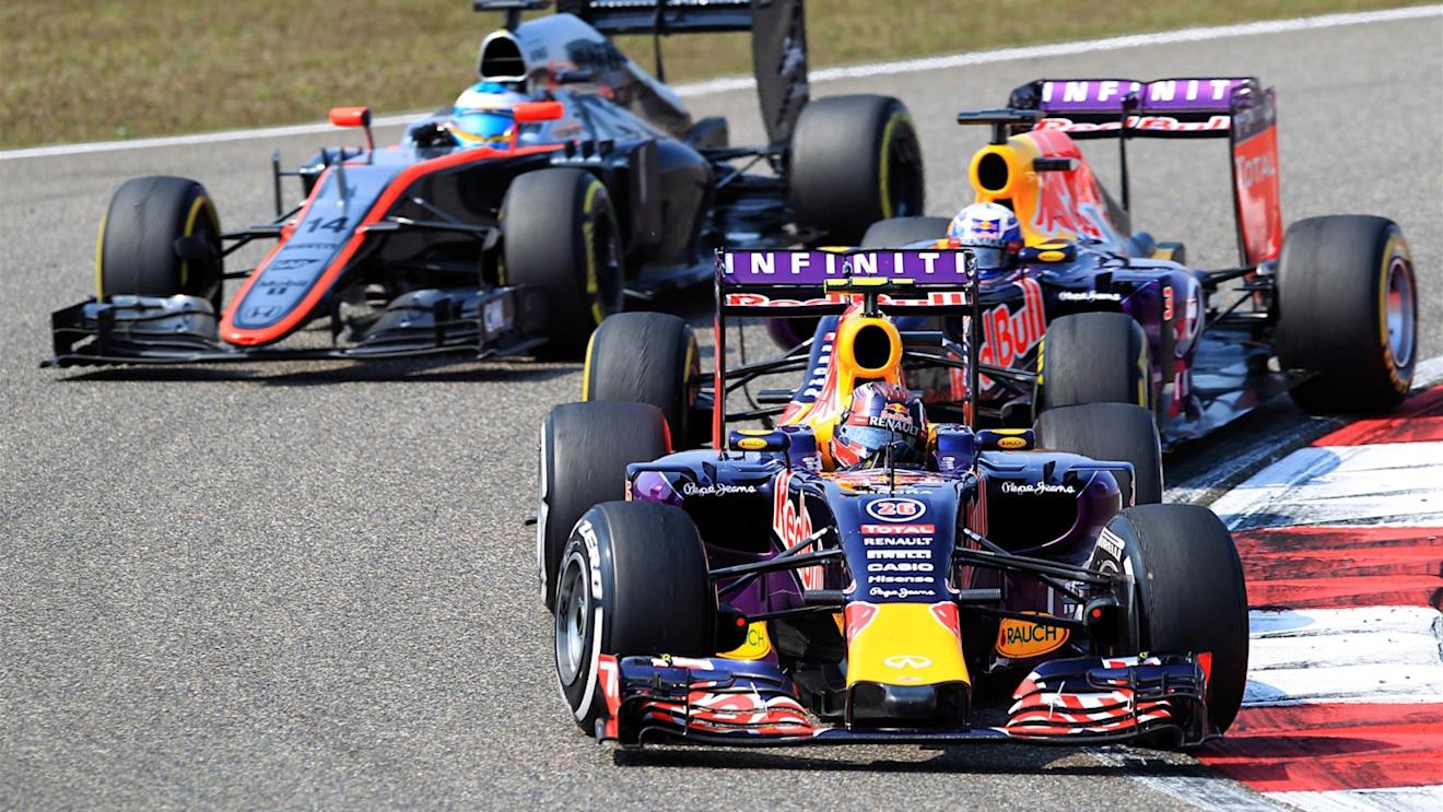 Daniil Kvyat (RUS) Red Bull Racing RB11 leads Daniel Ricciardo (AUS) Red Bull Racing RB11 and Fernando Alonso (ESP) McLaren MP4-30 at Formula One World Championship, Rd3, Chinese Grand Prix, Race, Shanghai, China, Sunday 12 April 2015. © Sutton Motorsport Images