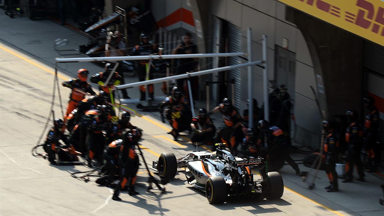 Sergio Perez (MEX) Force India VJM08 pit stop at Formula One World Championship, Rd3, Chinese Grand Prix, Race, Shanghai, China, Sunday 12 April 2015. © Sutton Motorsport Images