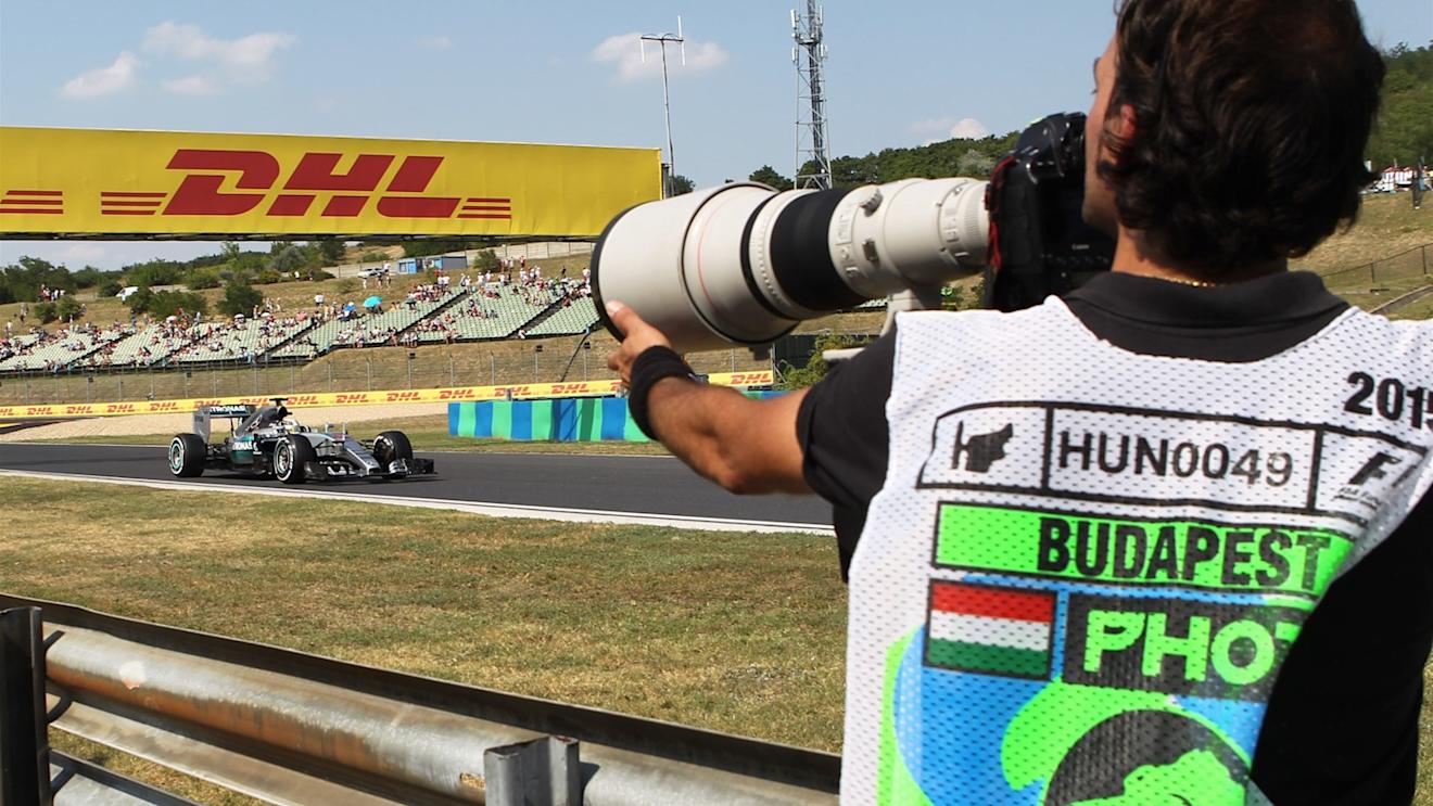 Lewis Hamilton (GBR) Mercedes AMG F1 W06 and photographer at Formula One World Championship, Rd10, Hungarian Grand Prix, Practice, Hungaroring, Hungary, Friday 24 July 2015. © Sutton Motorsport Images