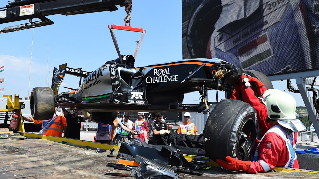 The crashed car of Sergio Perez (MEX) Force India VJM08 is recovered after rolling in FP1 at Formula One World Championship, Rd10, Hungarian Grand Prix, Practice, Hungaroring, Hungary, Friday 24 July 2015. © Sutton Motorsport Images