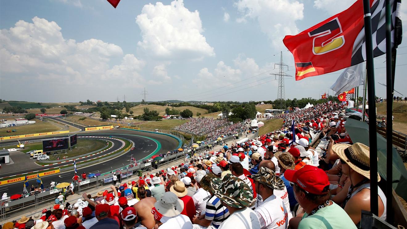 Kimi Raikkonen (FIN) Ferrari SF15-T passes Ferrari fans and flags at Formula One World Championship, Rd10, Hungarian Grand Prix, Qualifying, Hungaroring, Hungary, Saturday 25 July 2015. © Sutton Motorsport Images