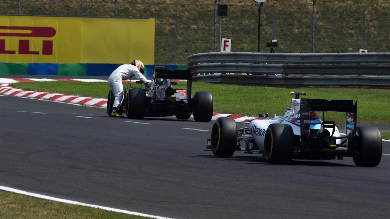 Fernando Alonso (ESP) McLaren MP4-30 pushes his car in Q2 at Formula One World Championship, Rd10, Hungarian Grand Prix, Qualifying, Hungaroring, Hungary, Saturday 25 July 2015. © Sutton Motorsport Images
