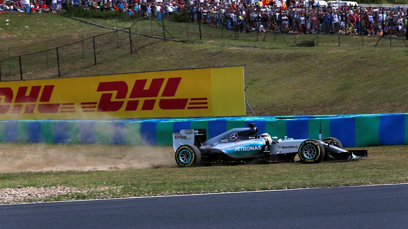 Lewis Hamilton (GBR) Mercedes AMG F1 W06 goes through the gravel on lap 1 at Formula One World Championship, Rd10, Hungarian Grand Prix, Race, Hungaroring, Hungary, Sunday 26 July 2015. © Sutton Motorsport Images