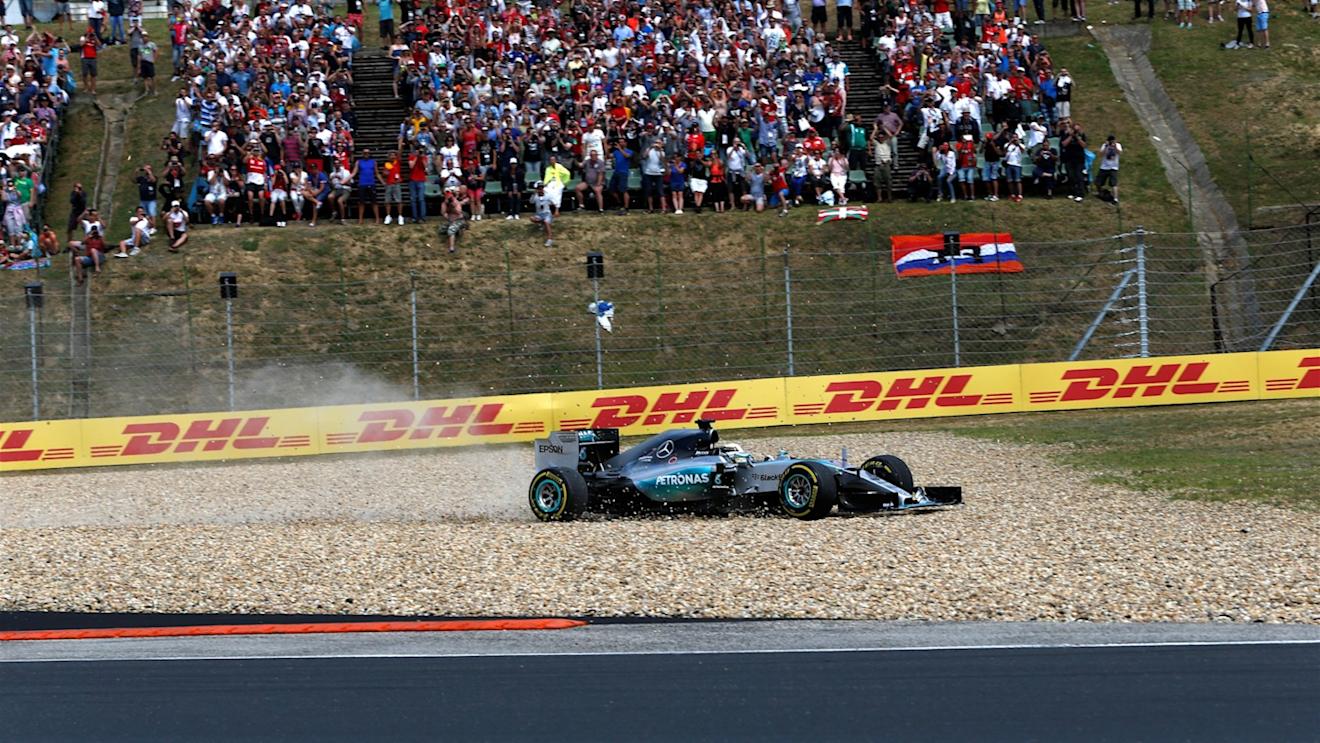 Lewis Hamilton (GBR) Mercedes AMG F1 W06 goes through the gravel on lap 1 at Formula One World Championship, Rd10, Hungarian Grand Prix, Race, Hungaroring, Hungary, Sunday 26 July 2015. © Sutton Motorsport Images