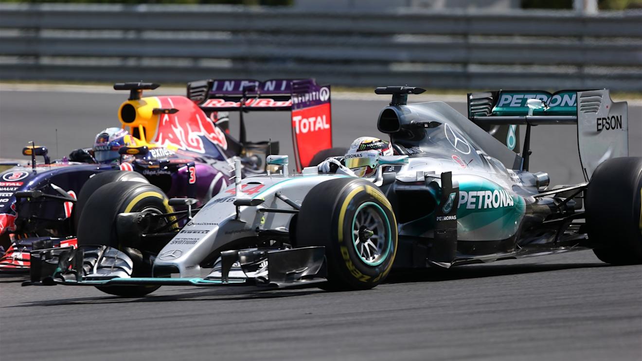 Lewis Hamilton (GBR) Mercedes AMG F1 W06 battles with Daniel Ricciardo (AUS) Red Bull Racing RB11 Formula One World Championship, Rd10, Hungarian Grand Prix, Race, Hungaroring, Hungary, Sunday 26 July 2015. © Sutton Motorsport Images