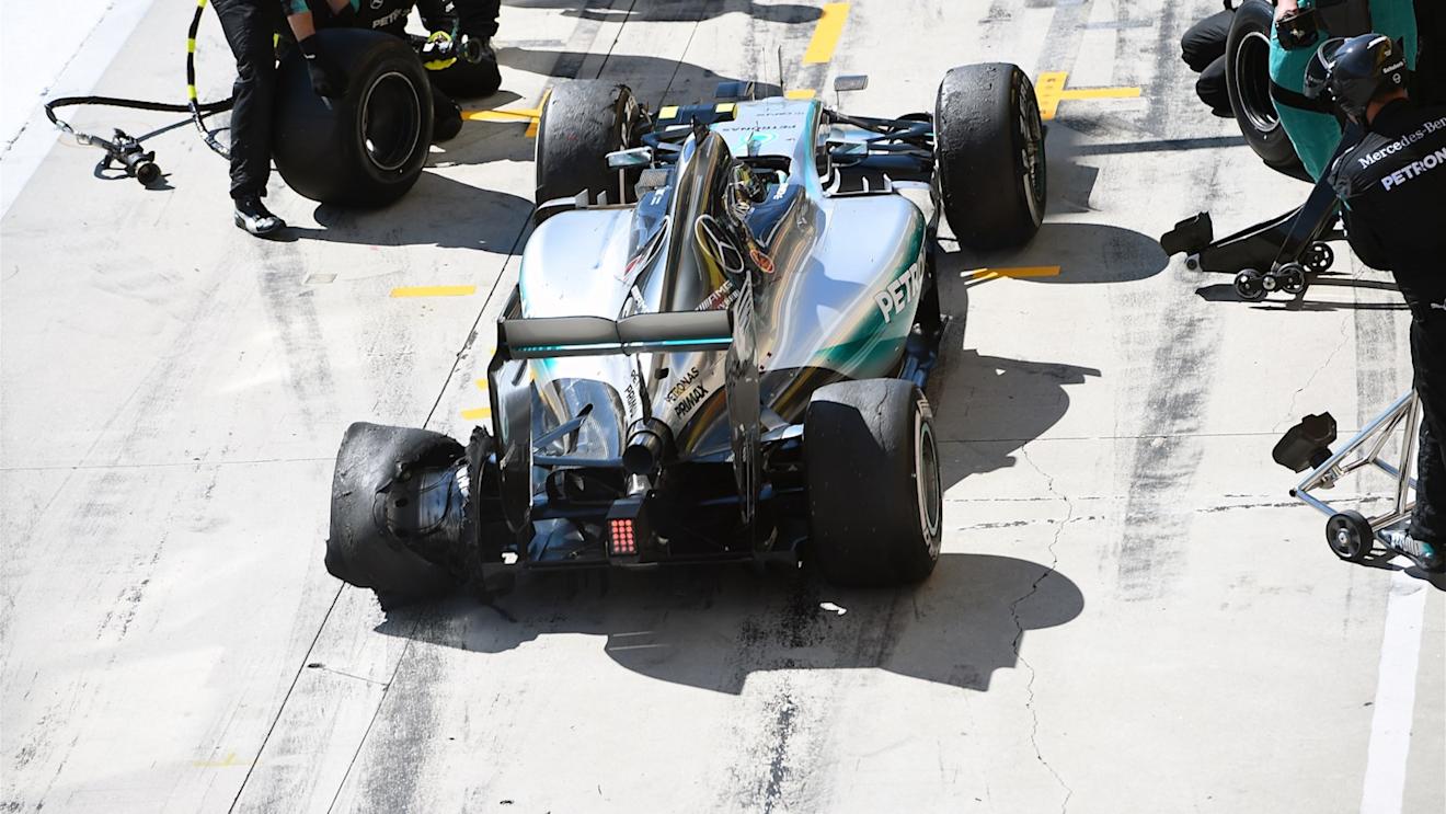 Nico Rosberg (GER) Mercedes AMG F1 W06 enters the pits with a punctured rear tyre at Formula One World Championship, Rd10, Hungarian Grand Prix, Race, Hungaroring, Hungary, Sunday 26 July 2015. © Sutton Motorsport Images