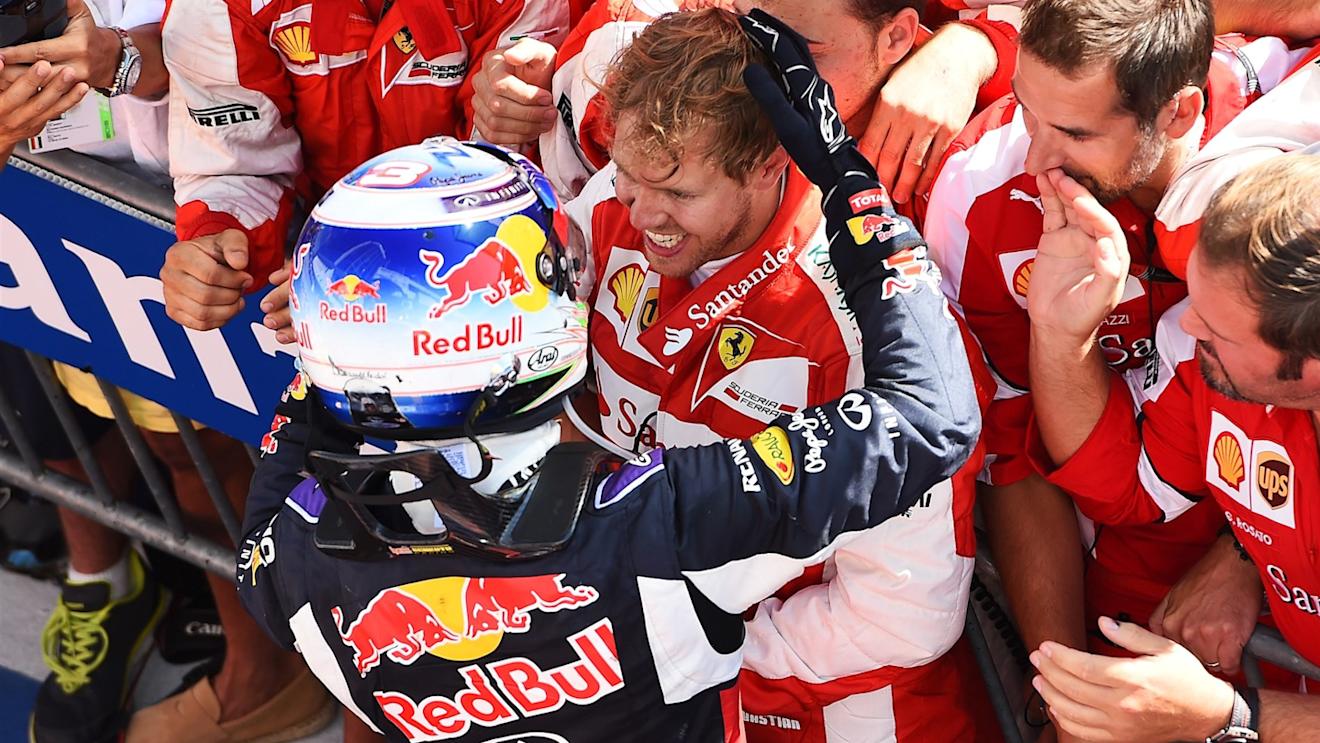 Race winnner Sebastian Vettel (GER) Ferrari celebrates with Daniel Ricciardo (AUS) Red Bull Racing in parc ferme at Formula One World Championship, Rd10, Hungarian Grand Prix, Race, Hungaroring, Hungary, Sunday 26 July 2015. © Sutton Motorsport Images