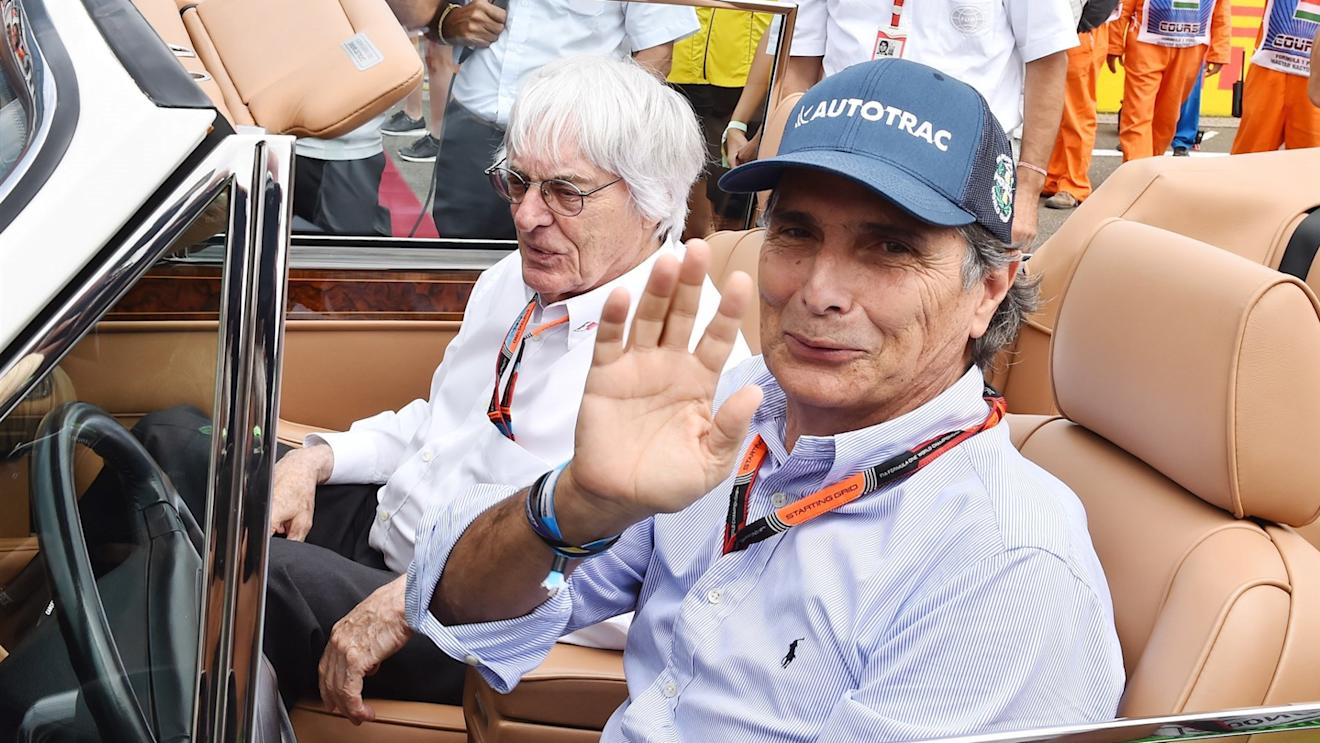 Nelson Piquet (BRA) and Bernie Ecclestone (GBR) CEO Formula One Group (FOM) in a Rolls Royce on the grid at Formula One World Championship, Rd10, Hungarian Grand Prix, Race, Hungaroring, Hungary, Sunday 26 July 2015. © Sutton Motorsport Images