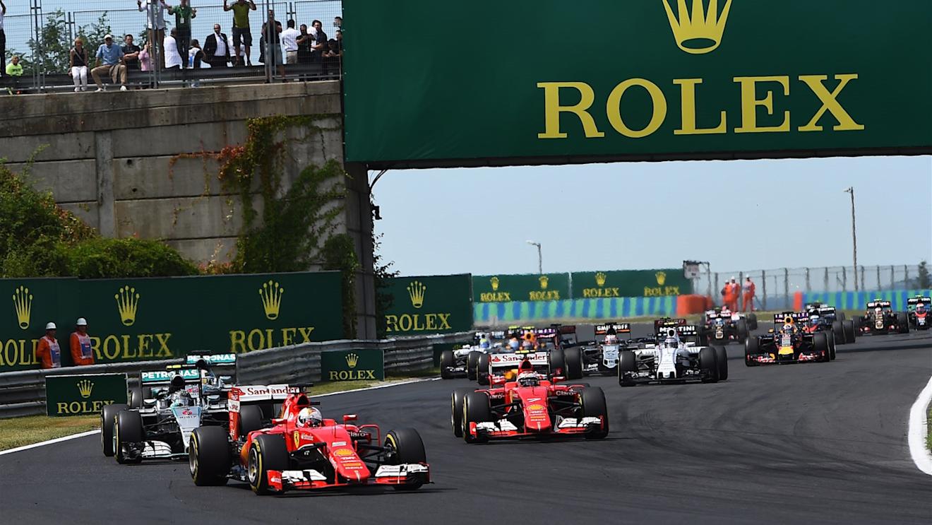 Sebastian Vettel (GER) Ferrari SF15-T leads at the start of the race at Formula One World Championship, Rd10, Hungarian Grand Prix, Race, Hungaroring, Hungary, Sunday 26 July 2015. © Sutton Motorsport Images