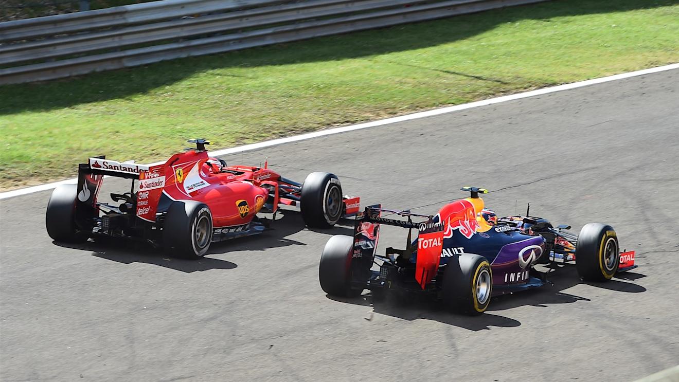 Kimi Raikkonen (FIN) Ferrari SF15-T and Daniil Kvyat (RUS) Red Bull Racing RB11 battle at Formula One World Championship, Rd10, Hungarian Grand Prix, Race, Hungaroring, Hungary, Sunday 26 July 2015. © Sutton Motorsport Images