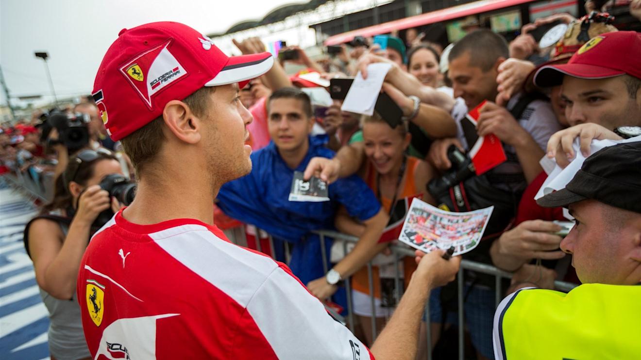 Sebastian Vettel (GER) Ferrari signs autographs for the fans at Formula One World Championship, Rd10, Hungarian Grand Prix, Preparations, Hungaroring, Hungary, Thursday 23 July 2015. © Sutton Motorsport Images