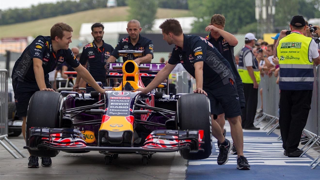 Red Bull Racing mechanics push Red Bull Racing RB11 in pit lane at Formula One World Championship, Rd10, Hungarian Grand Prix, Preparations, Hungaroring, Hungary, Thursday 23 July 2015. © Sutton Motorsport Images