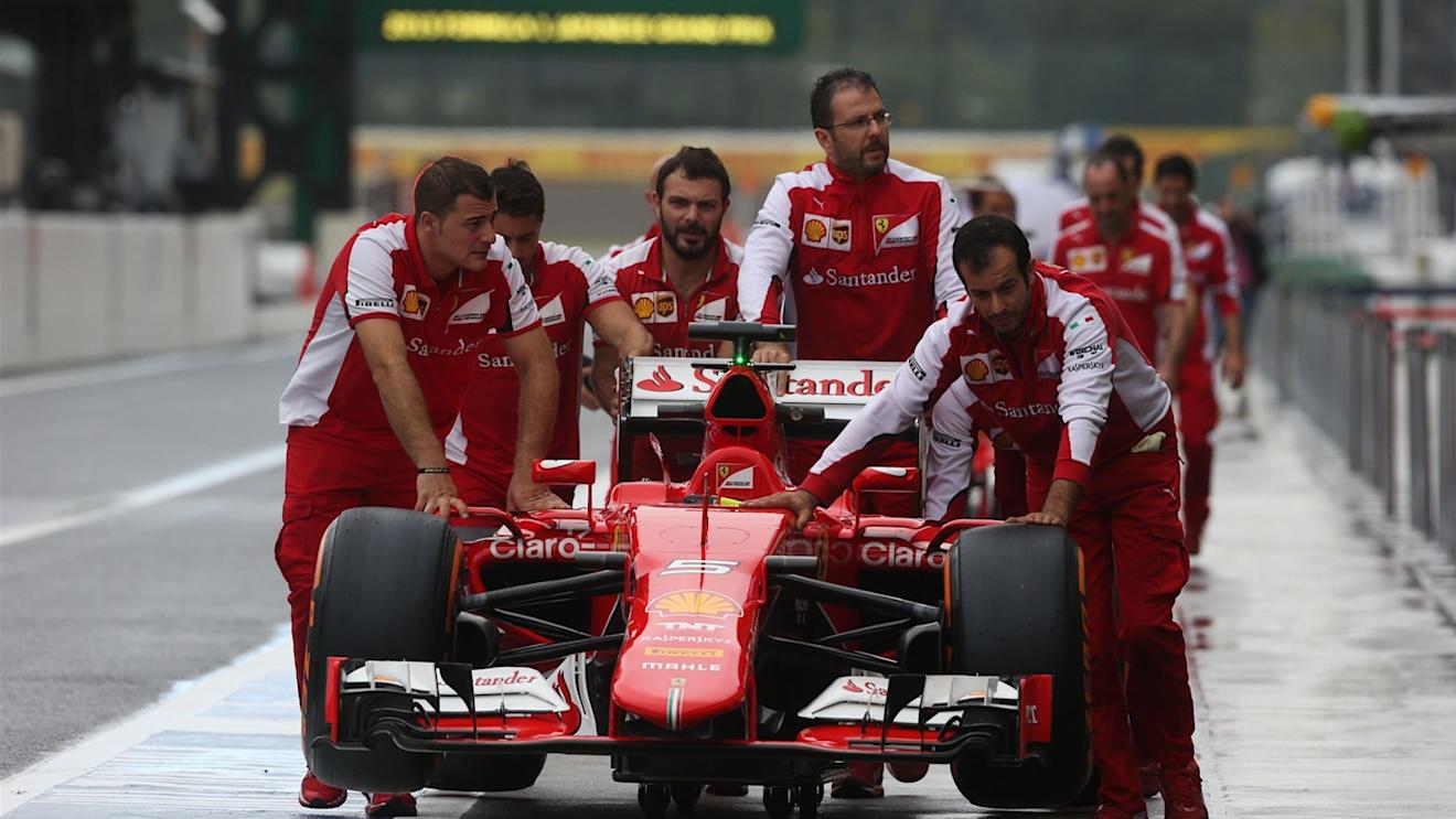 Ferrari mechanics with Ferrari SF15-T at Formula One World Championship, Rd14, Japanese Grand Prix, Practice, Suzuka, Japan, Friday 25 September 2015. © Sutton Motorsport Images