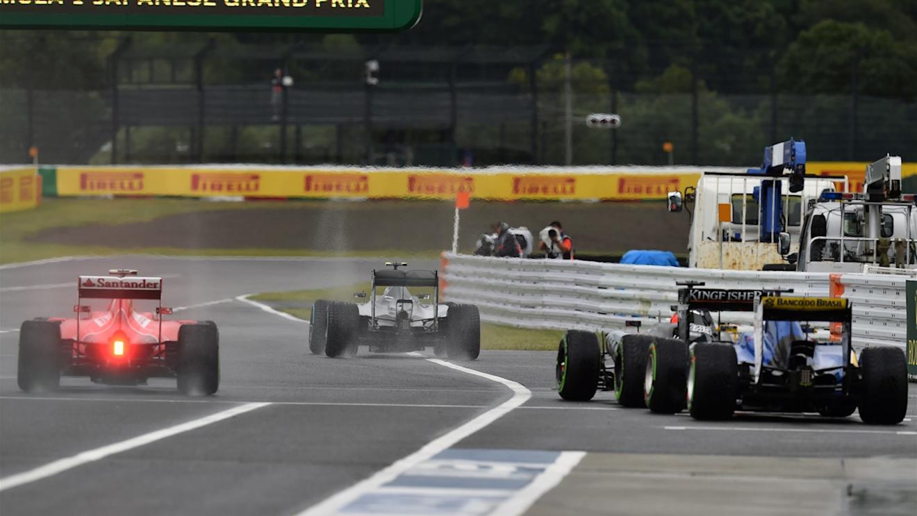 Cars leave pit lane at Formula One World Championship, Rd14, Japanese Grand Prix, Practice, Suzuka, Japan, Friday 25 September 2015. © Sutton Motorsport Images