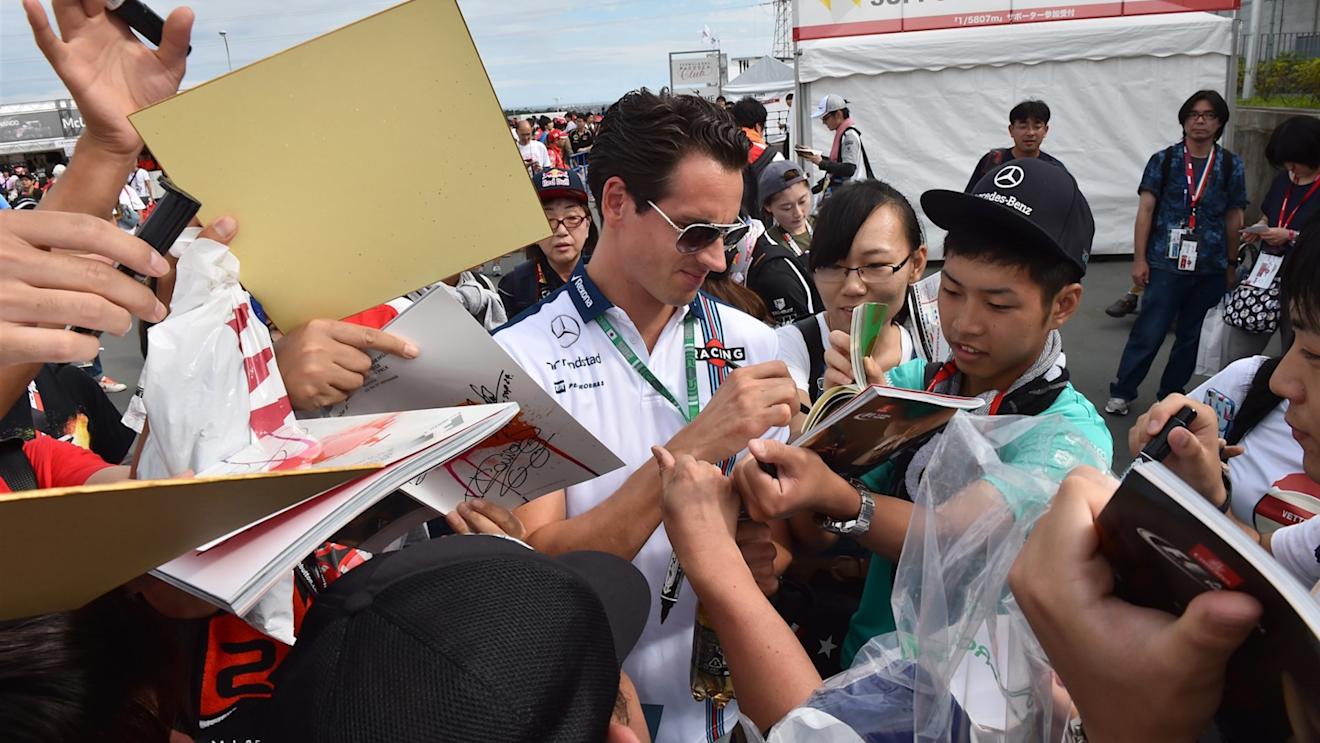 Adrian Sutil (GER) Williams Reserve Driver signs autographs for the fans at Formula One World Championship, Rd14, Japanese Grand Prix, Qualifying, Suzuka, Japan, Saturday 26 September 2015. © Sutton Motorsport Images