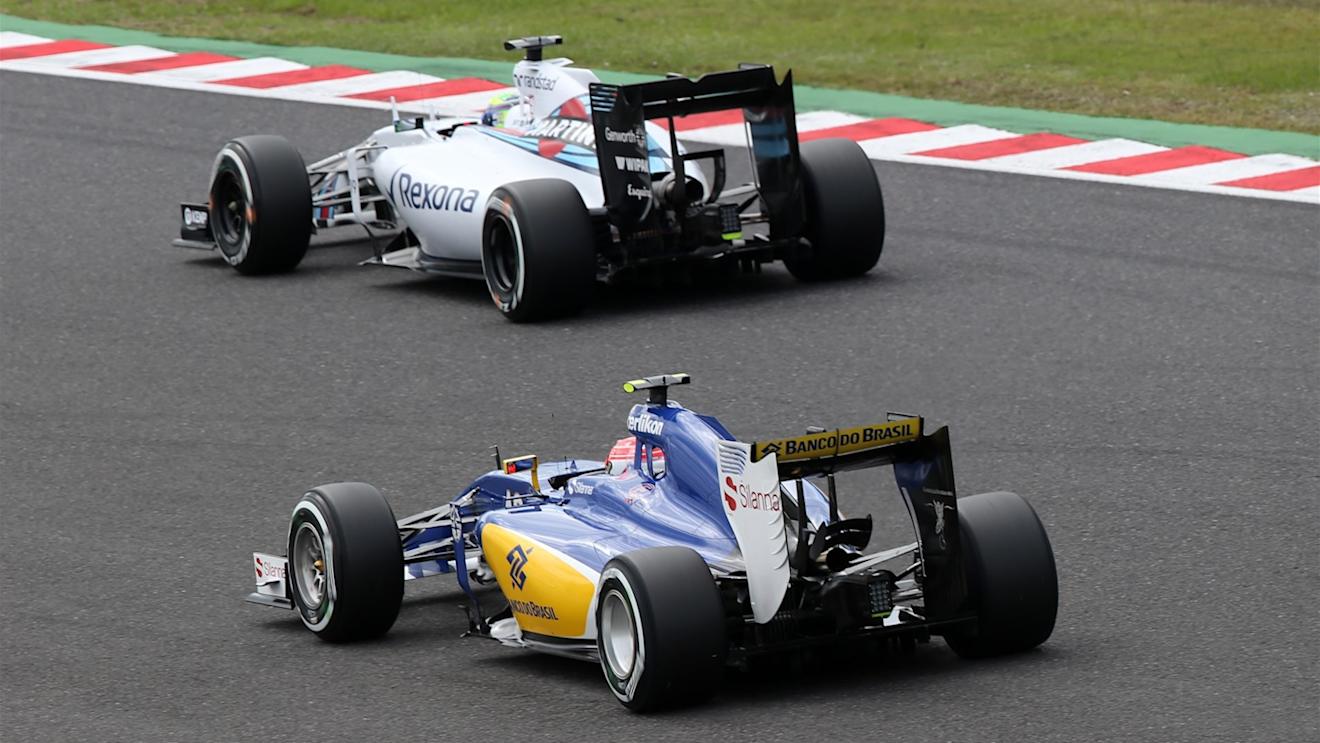 Felipe Nasr (BRA) Sauber C34 and Felipe Massa (BRA) Williams FW37 at Formula One World Championship, Rd14, Japanese Grand Prix, Qualifying, Suzuka, Japan, Saturday 26 September 2015. © Sutton Motorsport Images