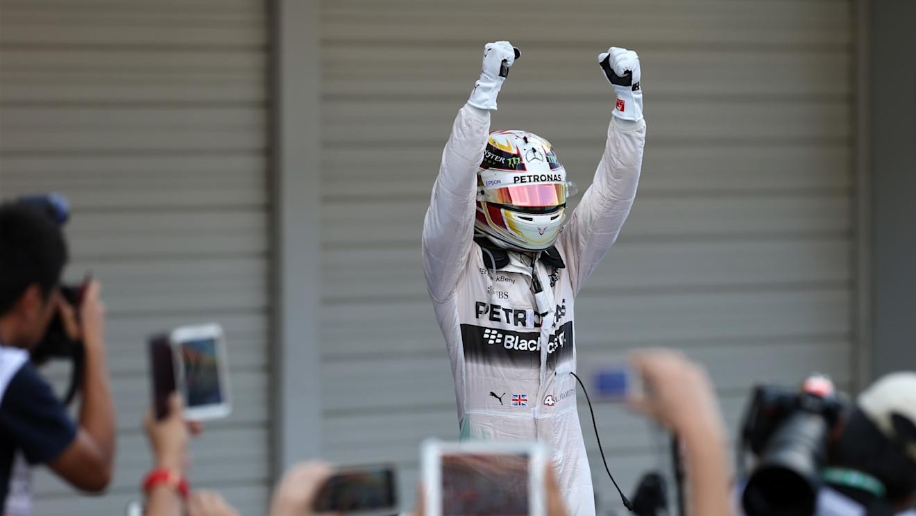Race winner Lewis Hamilton (GBR) Mercedes AMG F1 celebrates in parc ferme at Formula One World Championship, Rd14, Japanese Grand Prix, Race, Suzuka, Japan, Sunday 27 September 2015. © Sutton Motorsport Images