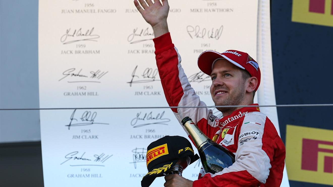 Sebastian Vettel (GER) Ferrari celebrates on the podium at Formula One World Championship, Rd14, Japanese Grand Prix, Race, Suzuka, Japan, Sunday 27 September 2015. © Sutton Motorsport Images
