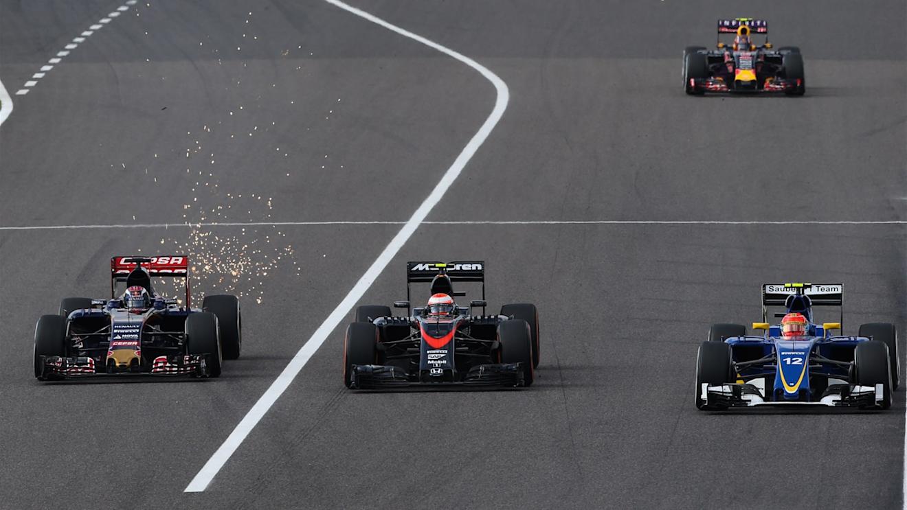 Max Verstappen (NDL) Scuderia Toro Rosso STR10, Jenson Button (GBR) McLaren MP4-30 and Felipe Nasr (BRA) Sauber C34 battle for position at Formula One World Championship, Rd14, Japanese Grand Prix, Race, Suzuka, Japan, Sunday 27 September 2015. © Sutton Motorsport Images