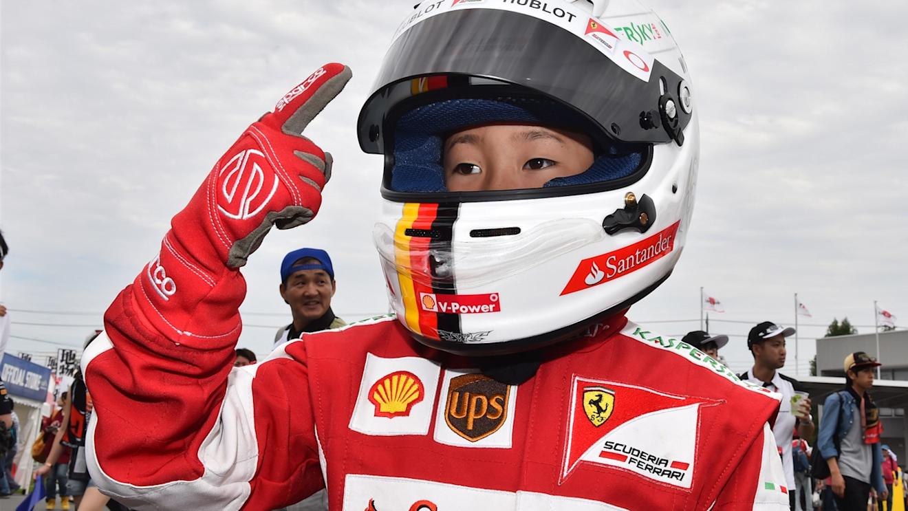 Sebastian Vettel (GER) Ferrari fan at Formula One World Championship, Rd14, Japanese Grand Prix, Race, Suzuka, Japan, Sunday 27 September 2015. © Sutton Motorsport Images