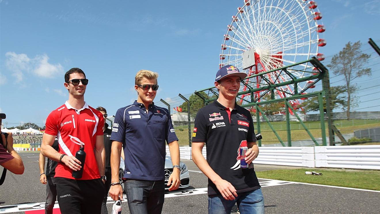 Alexander Rossi (USA) Marussia, Marcus Ericsson (SWE) Sauber and Max Verstappen (NDL) Scuderia Toro Rosso at the drivers parade at Formula One World Championship, Rd14, Japanese Grand Prix, Race, Suzuka, Japan, Sunday 27 September 2015. © Sutton Motorsport Images