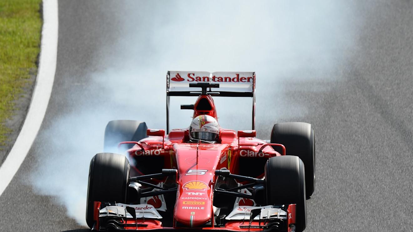 Sebastian Vettel (GER) Ferrari SF15-T locks up at Formula One World Championship, Rd14, Japanese Grand Prix, Race, Suzuka, Japan, Sunday 27 September 2015. © Sutton Motorsport Images