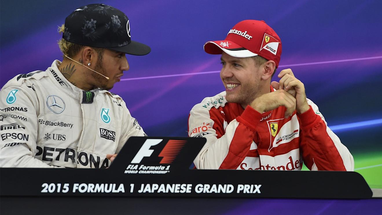 Lewis Hamilton (GBR) Mercedes AMG F1 and Sebastian Vettel (GER) Ferrari in the Press Conference at Formula One World Championship, Rd14, Japanese Grand Prix, Race, Suzuka, Japan, Sunday 27 September 2015. © Sutton Motorsport Images