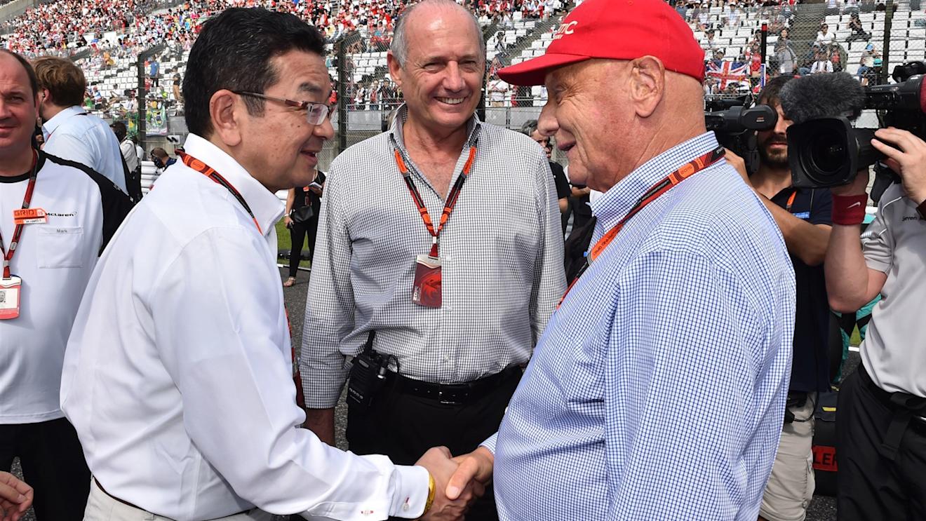 Takahiro Hachigo (JPN) Honda CEO and Niki Lauda (AUT) Mercedes AMG F1 Non-Executive Chairman on the grid with Ron Dennis (GBR) McLaren Executive Chairman at Formula One World Championship, Rd14, Japanese Grand Prix, Race, Suzuka, Japan, Sunday 27 September 2015. © Sutton Motorsport Images