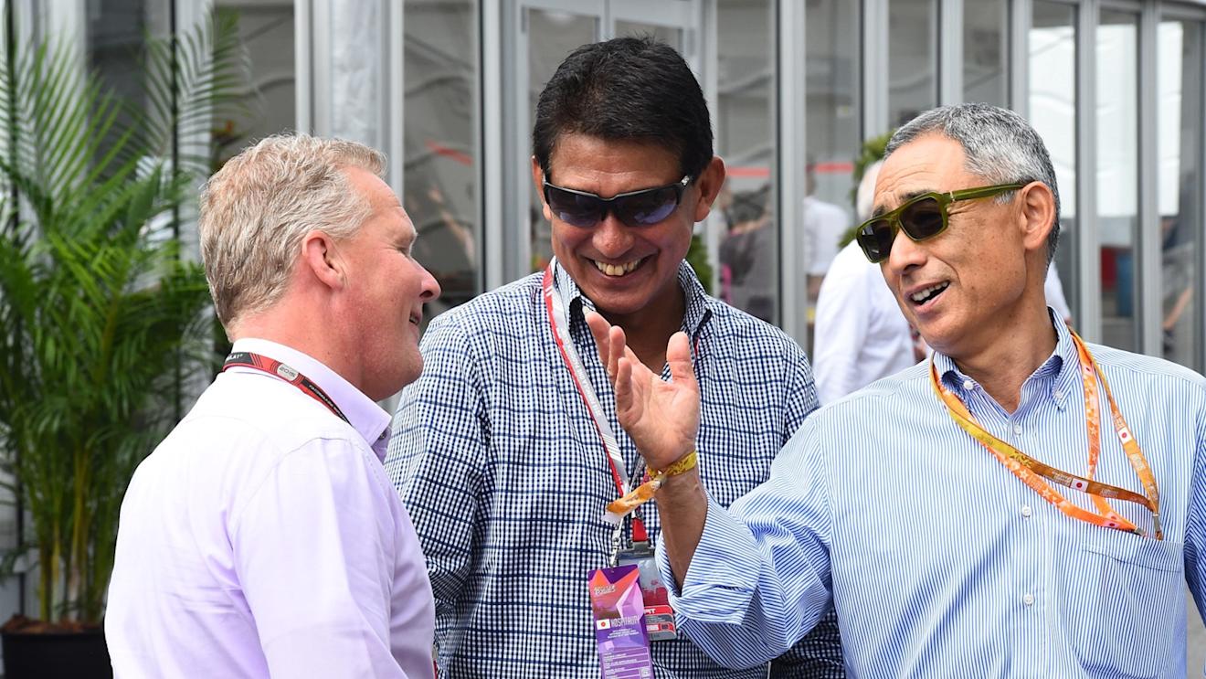 Aguri Suzuki (JPN) and Hiroshi Yasukawa (JPN) Ex-Bridgestone Director of Motorsport talks with Johnny Herbert (GBR) Sky TV at Formula One World Championship, Rd14, Japanese Grand Prix, Race, Suzuka, Japan, Sunday 27 September 2015. © Sutton Motorsport Images