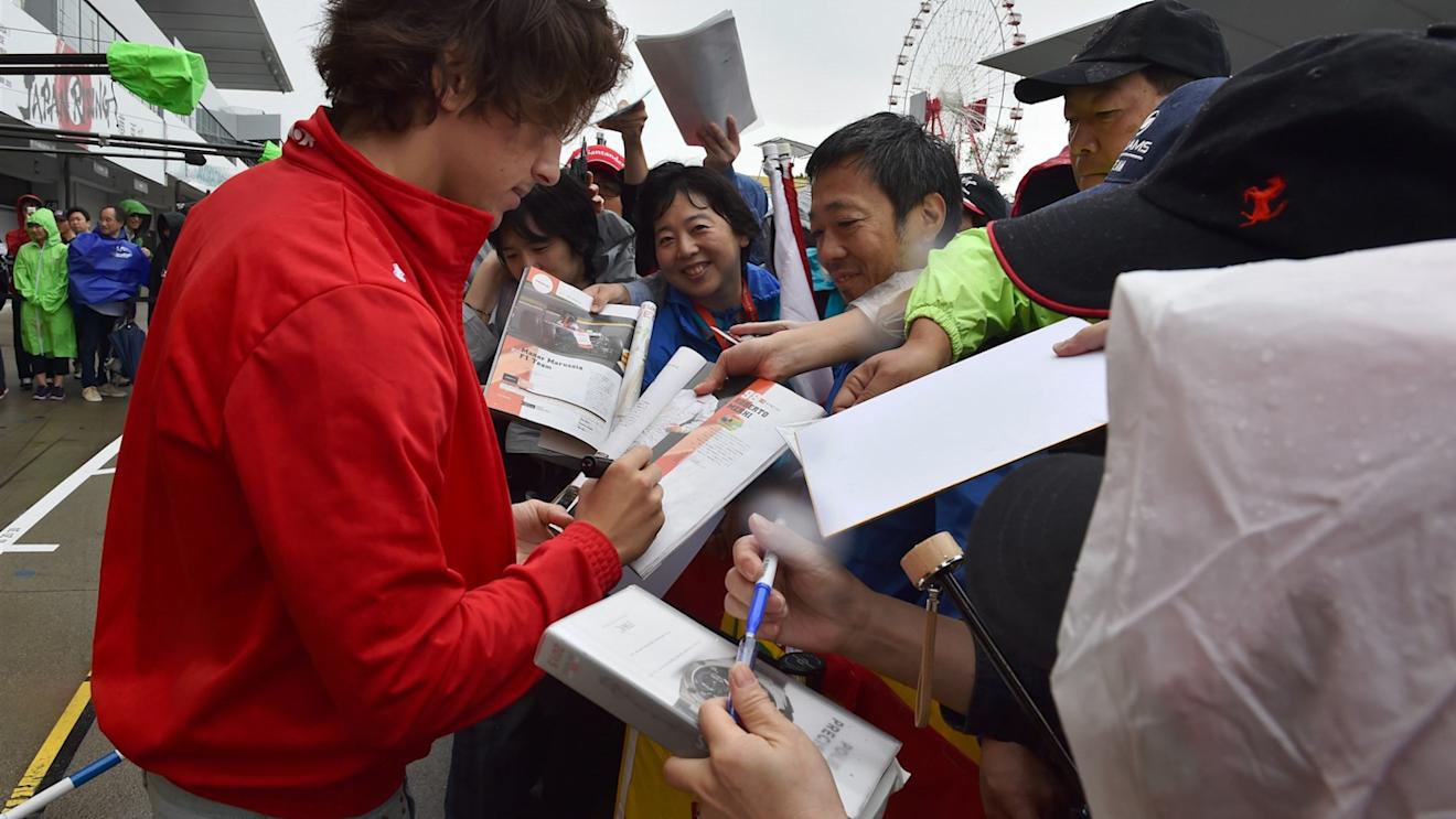 Roberto Merhi (ESP) Marussia signs autographs for the fans at Formula One World Championship, Rd14, Japanese Grand Prix, Preparations, Suzuka, Japan, Thursday 24 September 2015. © Sutton Motorsport Images