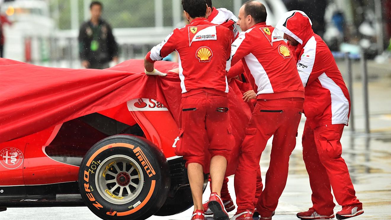 Ferrari mechanics with Ferrari SF15-T at Formula One World Championship, Rd14, Japanese Grand Prix, Preparations, Suzuka, Japan, Thursday 24 September 2015. © Sutton Motorsport Images