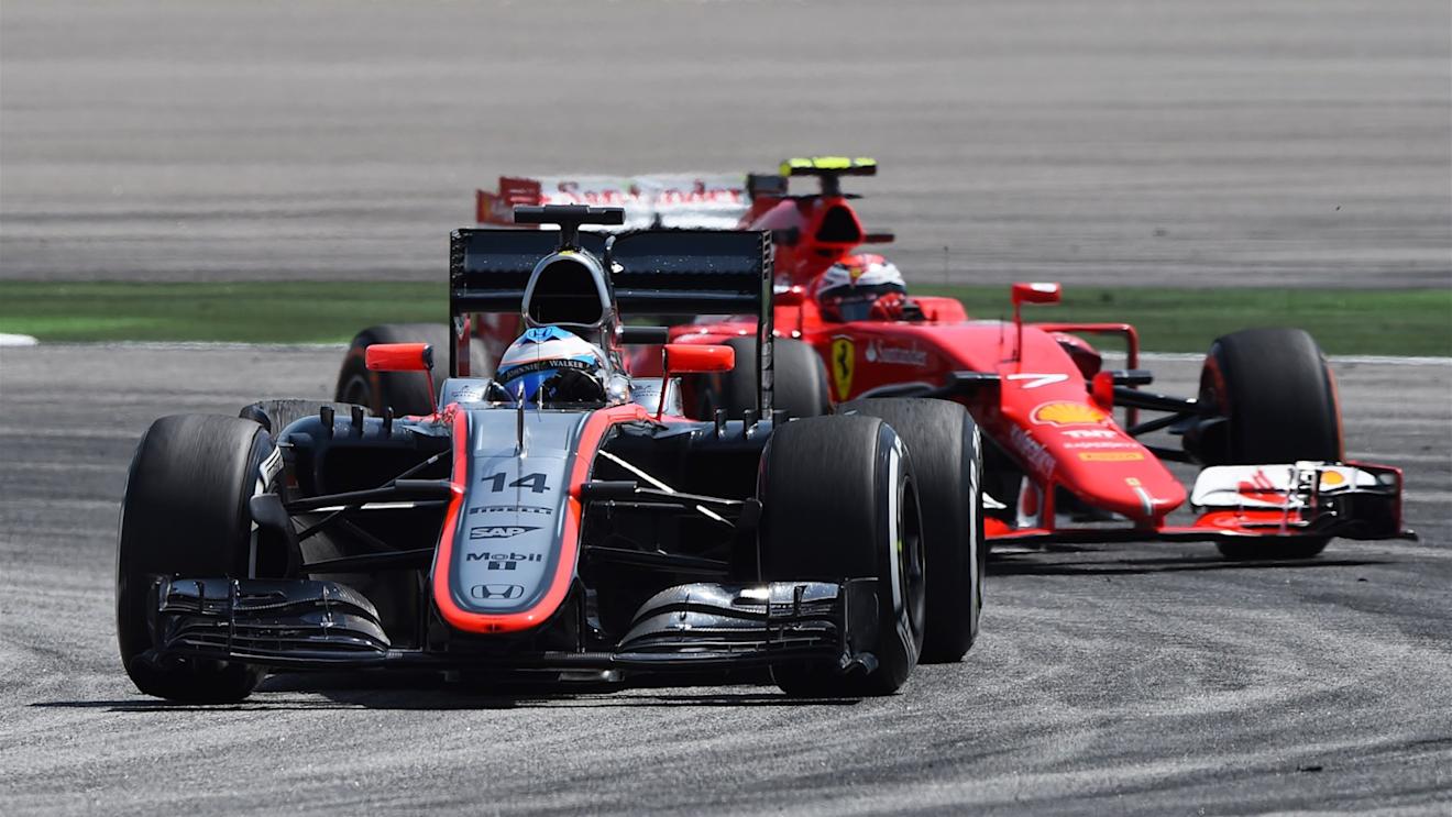 Fernando Alonso (ESP) McLaren MP4-30 leads Kimi Raikkonen (FIN) Ferrari SF15-T at Formula One World Championship, Rd2, Malaysian Grand Prix, Practice, Sepang, Malaysia, Friday 27  March 2015. © Sutton Motorsport Images