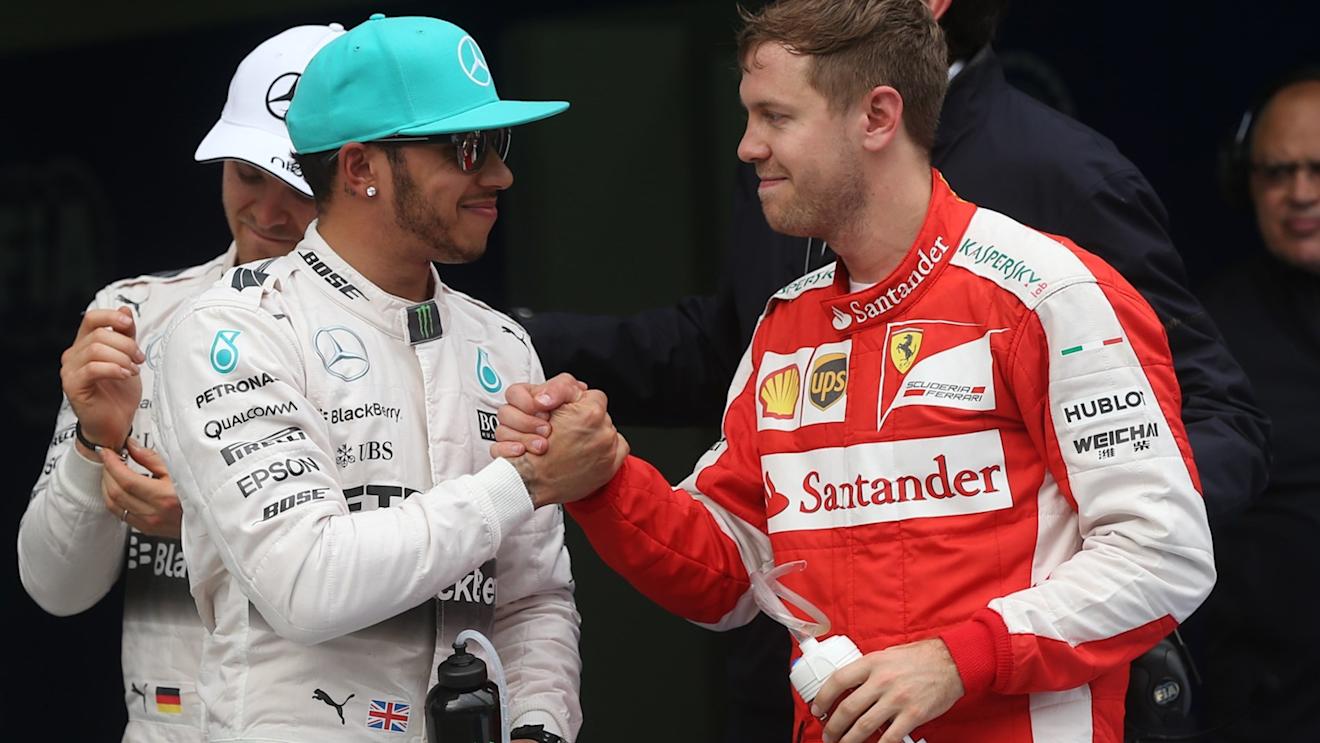 Congratulation for taking pole position to Lewis Hamilton (GBR) Mercedes AMG F1 from Sebastian Vettel (GER) Ferrari at Formula One World Championship, Rd2, Malaysian Grand Prix, Qualifying, Sepang, Malaysia, Saturday 28  March 2015. © Sutton Motorsport Images