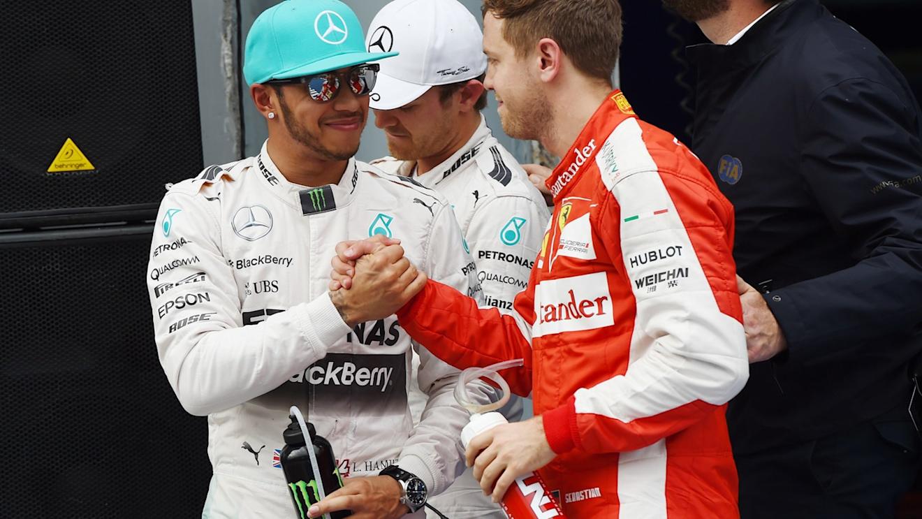 Pole sitter Lewis Hamilton (GBR) Mercedes AMG F1 and Sebastian Vettel (GER) Ferrari celebrate in parc ferme at Formula One World Championship, Rd2, Malaysian Grand Prix, Qualifying, Sepang, Malaysia, Saturday 28  March 2015. © Sutton Motorsport Images
