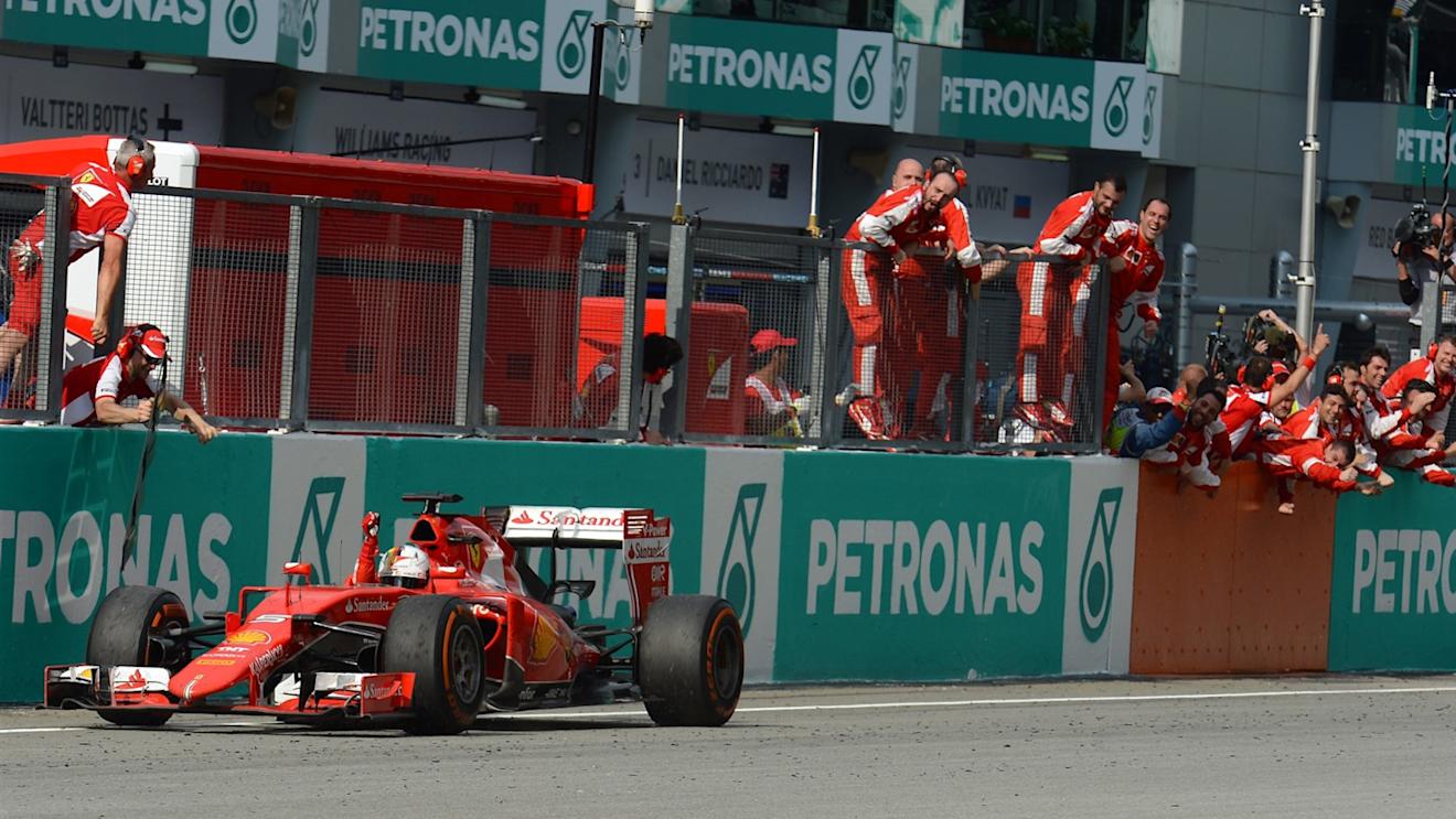 Race winner Sebastian Vettel (GER) Ferrari SF15-T crosses the line Formula One World Championship, Rd2, Malaysian Grand Prix, Race, Sepang, Malaysia, Sunday 29 March 2015. © Sutton Motorsport Images