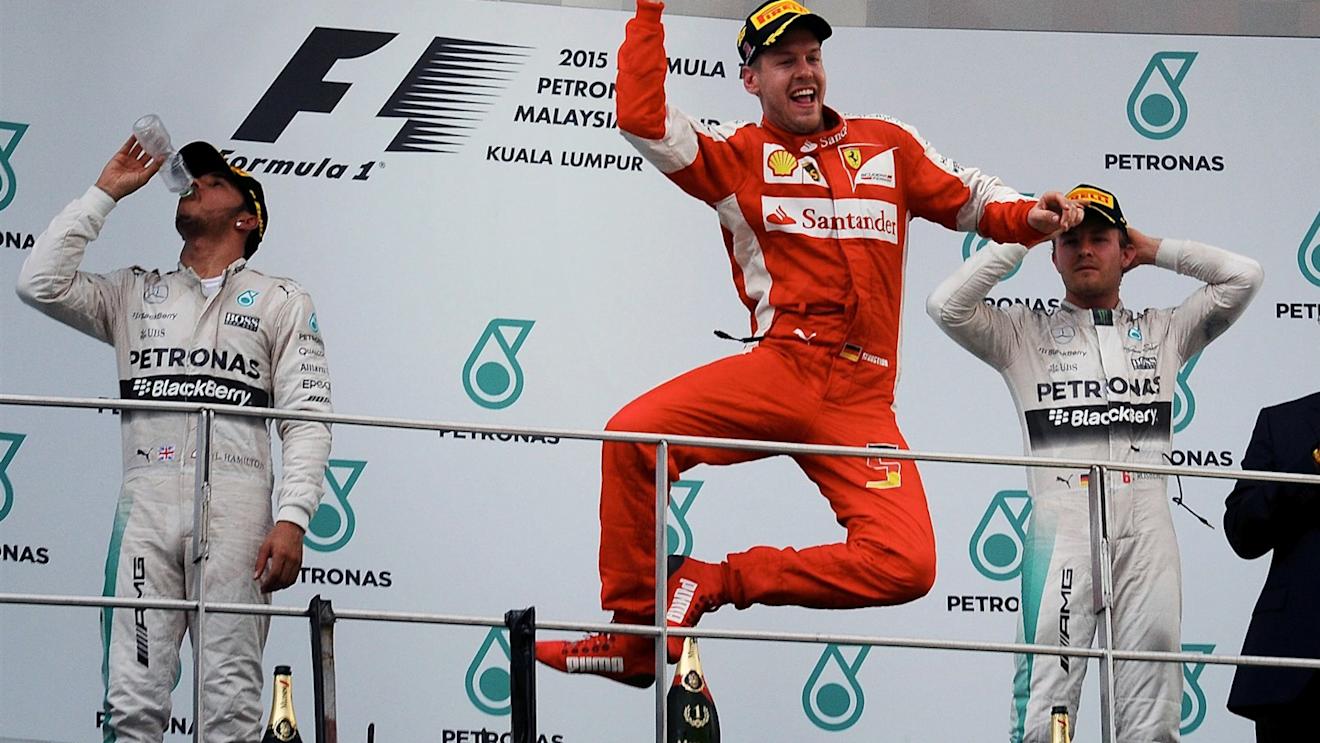 Race winner Sebastian Vettel (GER) Ferrari celebrates on the podium at Formula One World Championship, Rd2, Malaysian Grand Prix, Race, Sepang, Malaysia, Sunday 29 March 2015. © Sutton Motorsport Images
