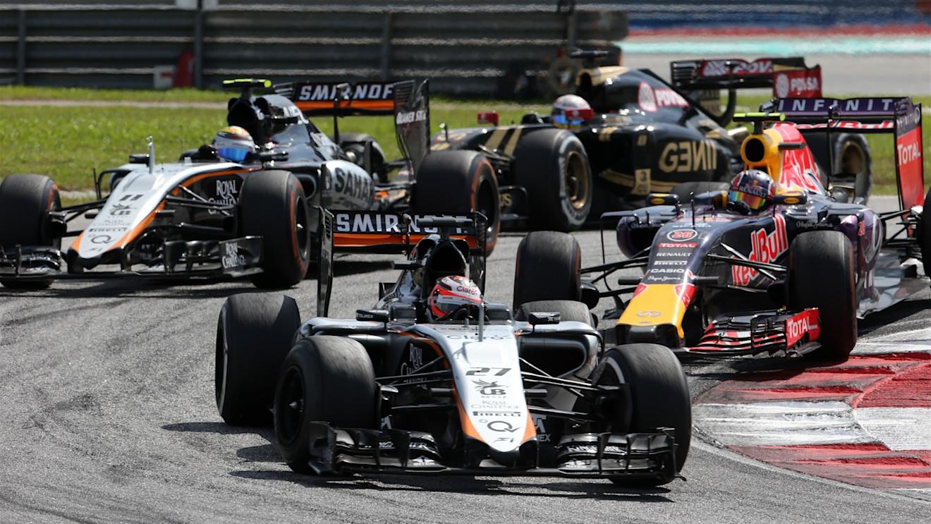 Nico Hulkenberg (GER) Force India VJM08 leads Daniil Kvyat (RUS) Red Bull Racing RB11 at Formula One World Championship, Rd2, Malaysian Grand Prix, Race, Sepang, Malaysia, Sunday 29 March 2015. © Sutton Motorsport Images