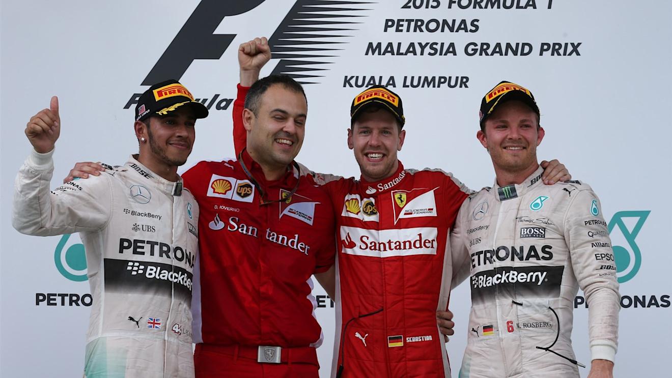 Podium (L to R): Second placed Lewis Hamilton (GBR) Mercedes AMG F1, Diego Ioverno (ITA) Ferrari Operations Director, race winner Sebastian Vettel (GER) Ferrari and Nico Rosberg (GER) Mercedes AMG F1 celebrate on the podium at Formula One World Championship, Rd2, Malaysian Grand Prix, Race, Sepang, Malaysia, Sunday 29 March 2015. © Sutton Motorsport Images