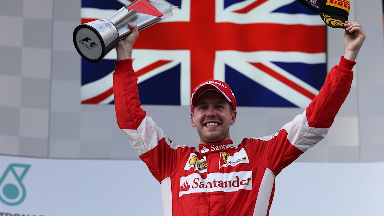 Race winner Sebastian Vettel (GER) Ferrari celebrates on the podium on the podium at Formula One World Championship, Rd2, Malaysian Grand Prix, Race, Sepang, Malaysia, Sunday 29 March 2015. © Sutton Motorsport Images
