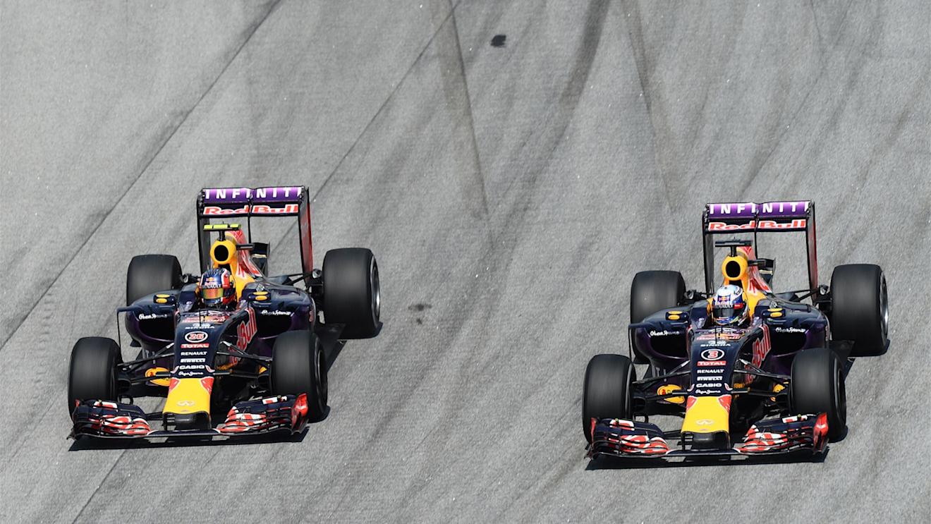 Daniil Kvyat (RUS) Red Bull Racing RB11 and Daniel Ricciardo (AUS) Red Bull Racing RB11 battle at Formula One World Championship, Rd2, Malaysian Grand Prix, Race, Sepang, Malaysia, Sunday 29 March 2015. © Sutton Motorsport Images