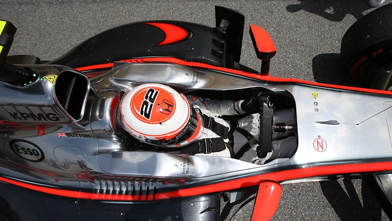 Jenson Button (GBR) McLaren MP4-30 on the grid at Formula One World Championship, Rd2, Malaysian Grand Prix, Race, Sepang, Malaysia, Sunday 29 March 2015. © Sutton Motorsport Images