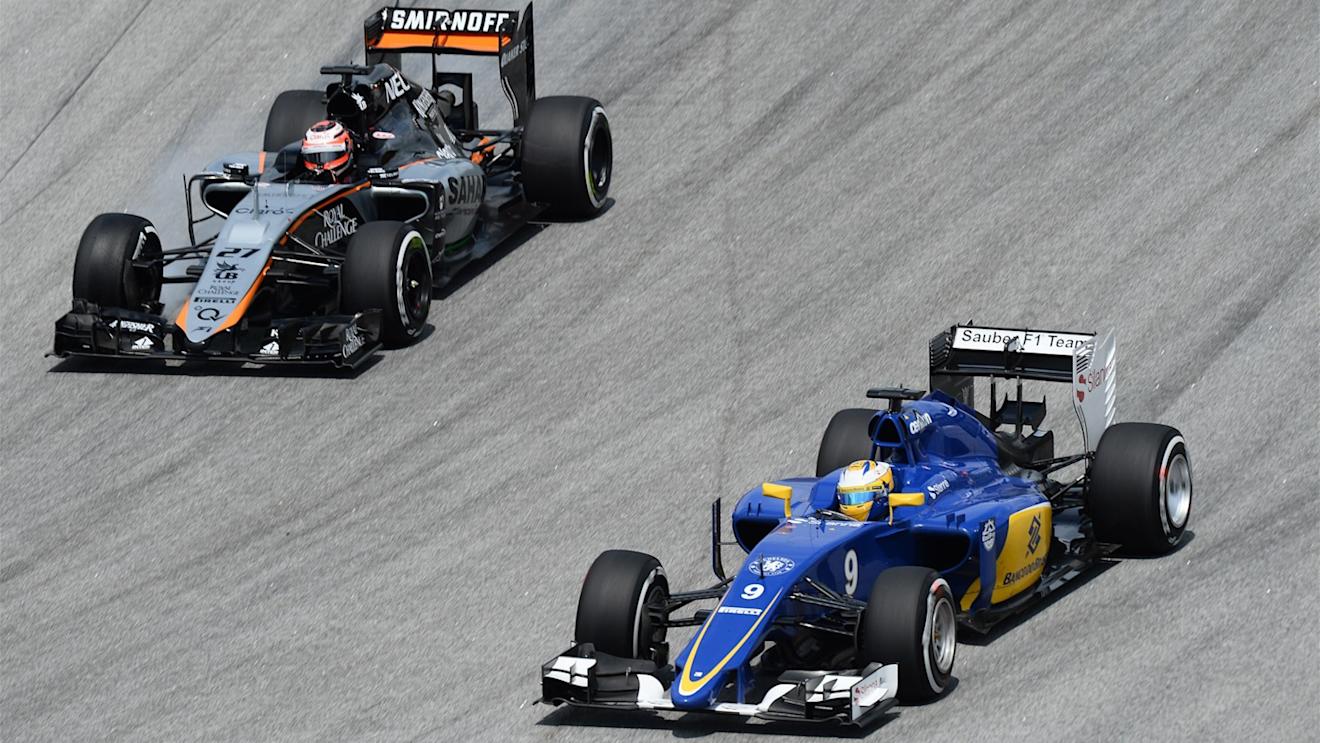 Marcus Ericsson (SWE) Sauber C34 and Nico Hulkenberg (GER) Force India VJM08 battle at Formula One World Championship, Rd2, Malaysian Grand Prix, Race, Sepang, Malaysia, Sunday 29 March 2015. © Sutton Motorsport Images