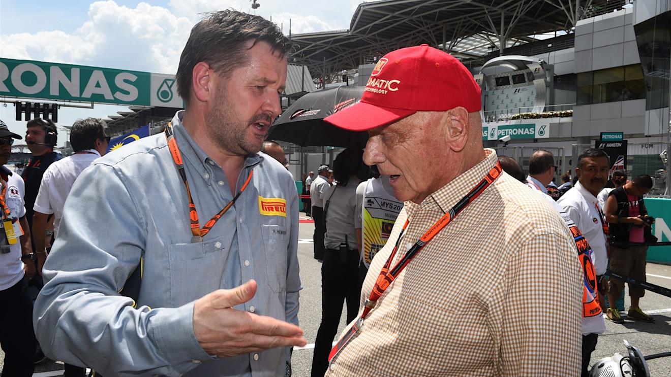 Paul Hembery (GBR) Pirelli Motorsport Director and Niki Lauda (AUT) Mercedes AMG F1 Non-Executive Chairman on the grid at Formula One World Championship, Rd2, Malaysian Grand Prix, Race, Sepang, Malaysia, Sunday 29 March 2015. © Sutton Motorsport Images