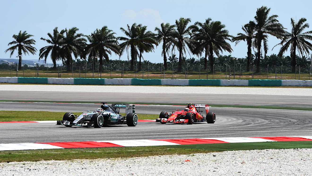 Lewis Hamilton (GBR) Mercedes AMG F1 W06 and Kimi Raikkonen (FIN) Ferrari SF15-T at Formula One World Championship, Rd2, Malaysian Grand Prix, Practice, Sepang, Malaysia, Friday 27  March 2015. © Sutton Motorsport Images